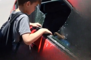 I was walking to school when I saw a baby trapped in a car under