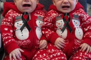 Young woman puts both babies inside the fir… See more