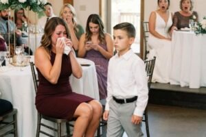 Young Boy Silences Entire Wedding Reception To Defend His Single Mother