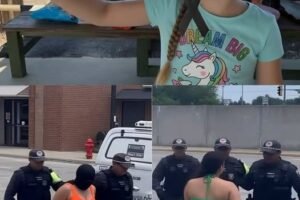 Young woman puts both babies inside the fir…